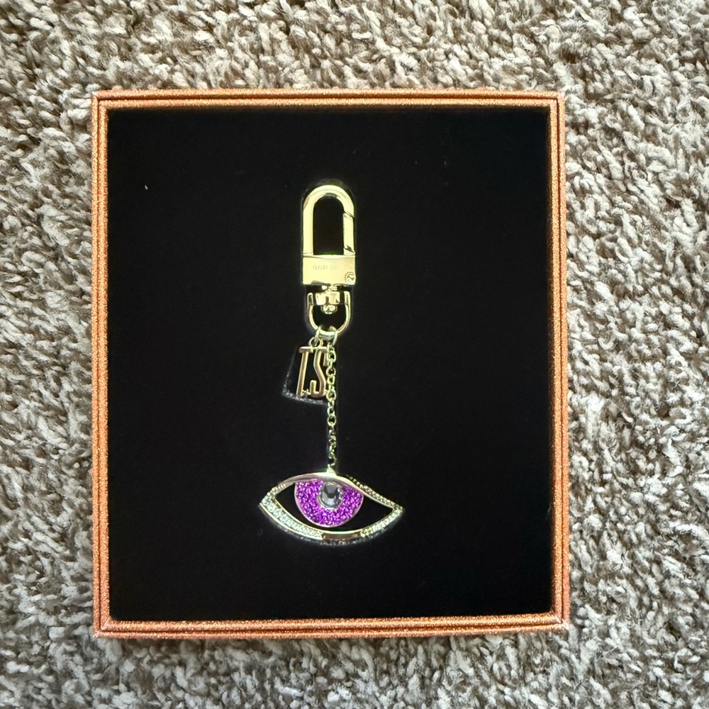 Taylor Swift The Life of a Showgirl “Sweat and Vanilla perfume” edition keychain